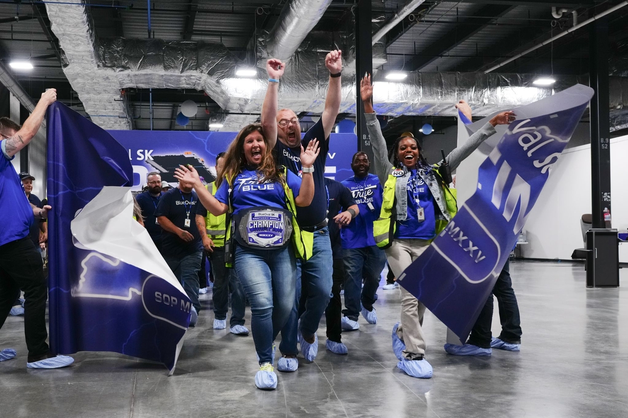 BlueOval SK officials celebrate the rollout of the 1st commercially produced batteries at its first Kentucky plant in Glendale on Tuesday. (BlueOval SK's LinkedIn account)