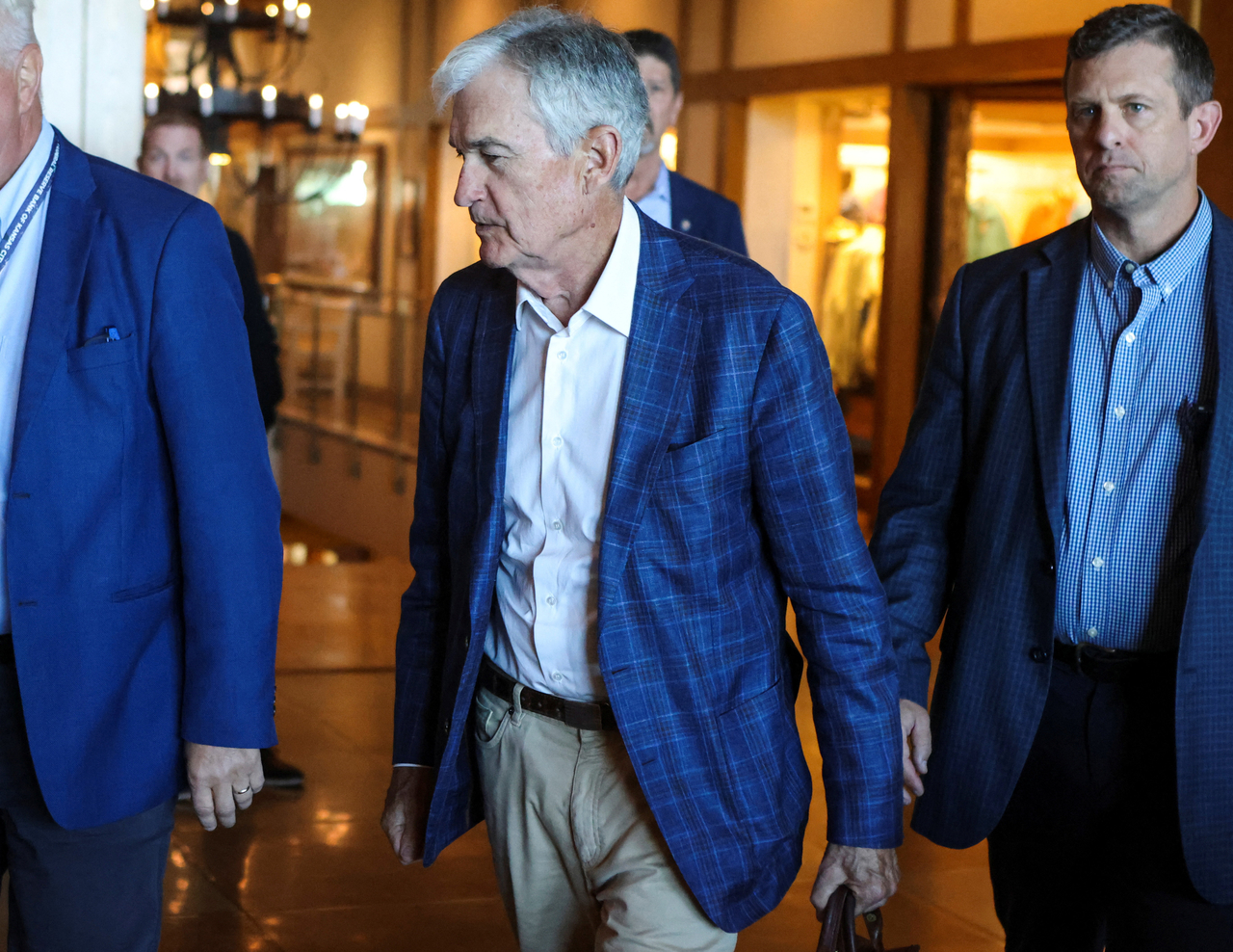US Federal Reserve Chairman Jerome Powell (center) attends the Federal Reserve Bank of Kansas City's 2025 Jackson Hole economic symposium, "Labor Markets in Transition: Demographics, Productivity, and Macroeconomic Policy" in Jackson Hole, Wyoming, Saturday.   Reuters-Yonhap