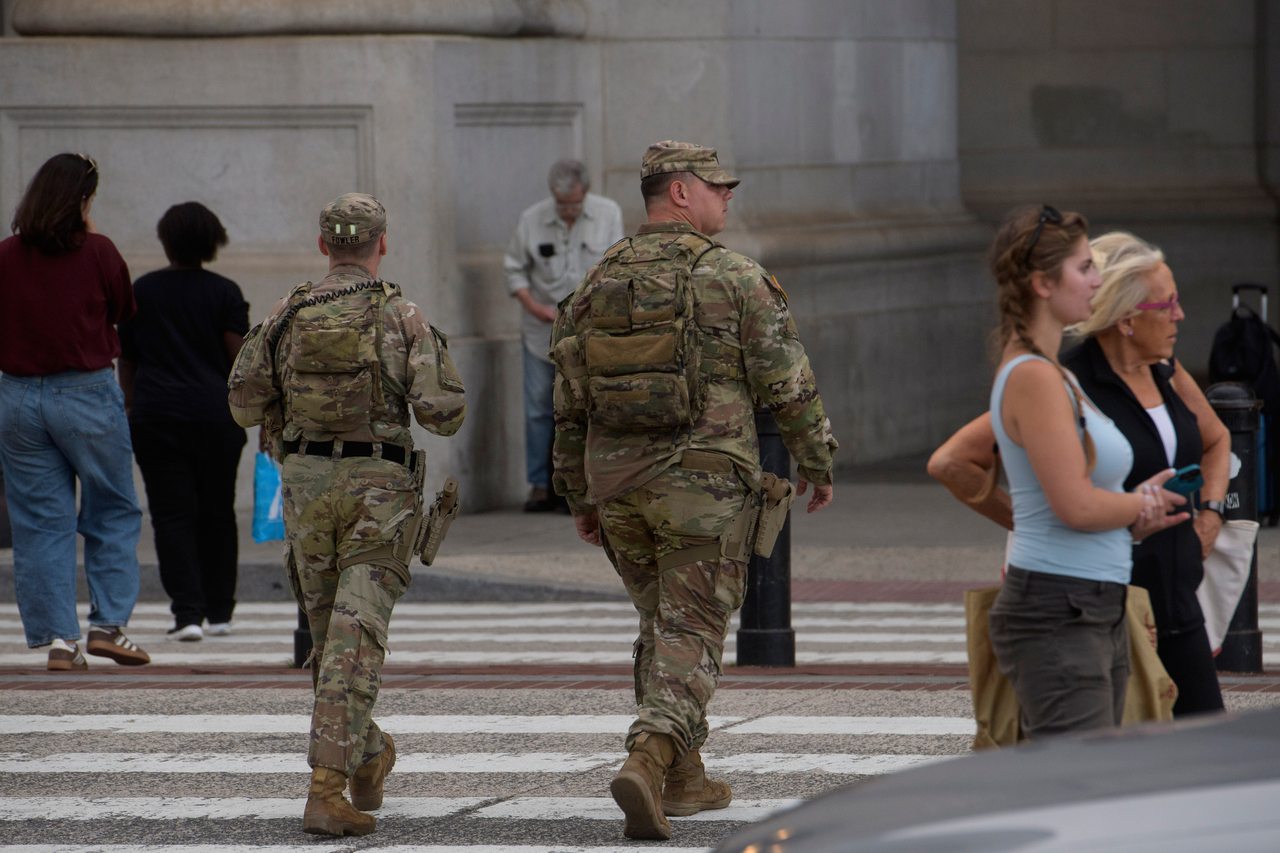 Armed members of the South Carolina National Guard patrol outside of Union Station in Washington on Sunday.   AP-Yonhap