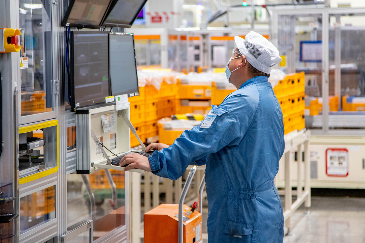 An employee checks a battery production line at LG Energy Solution's plant in Holland, Michigan. (LG Energy Solution)