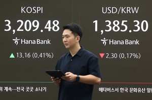Seoul shares open higher tracking Wall Street gains