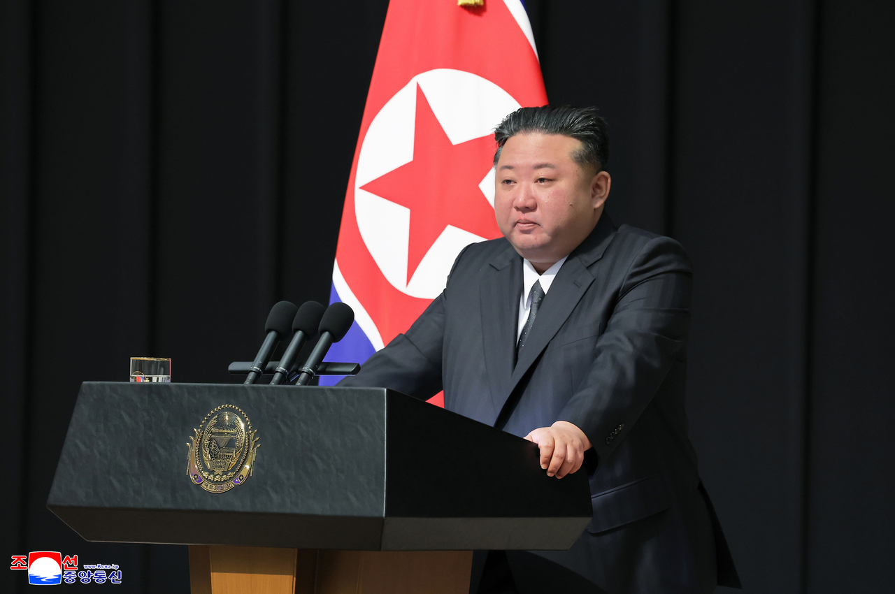 This photo, carried by North Korea's official Korean Central News Agency on Saturday, shows the North's leader Kim Jong-un attending a ceremony decorating North Korean troops deployed to Russia for the war with Ukraine the previous day. (Yonhap)