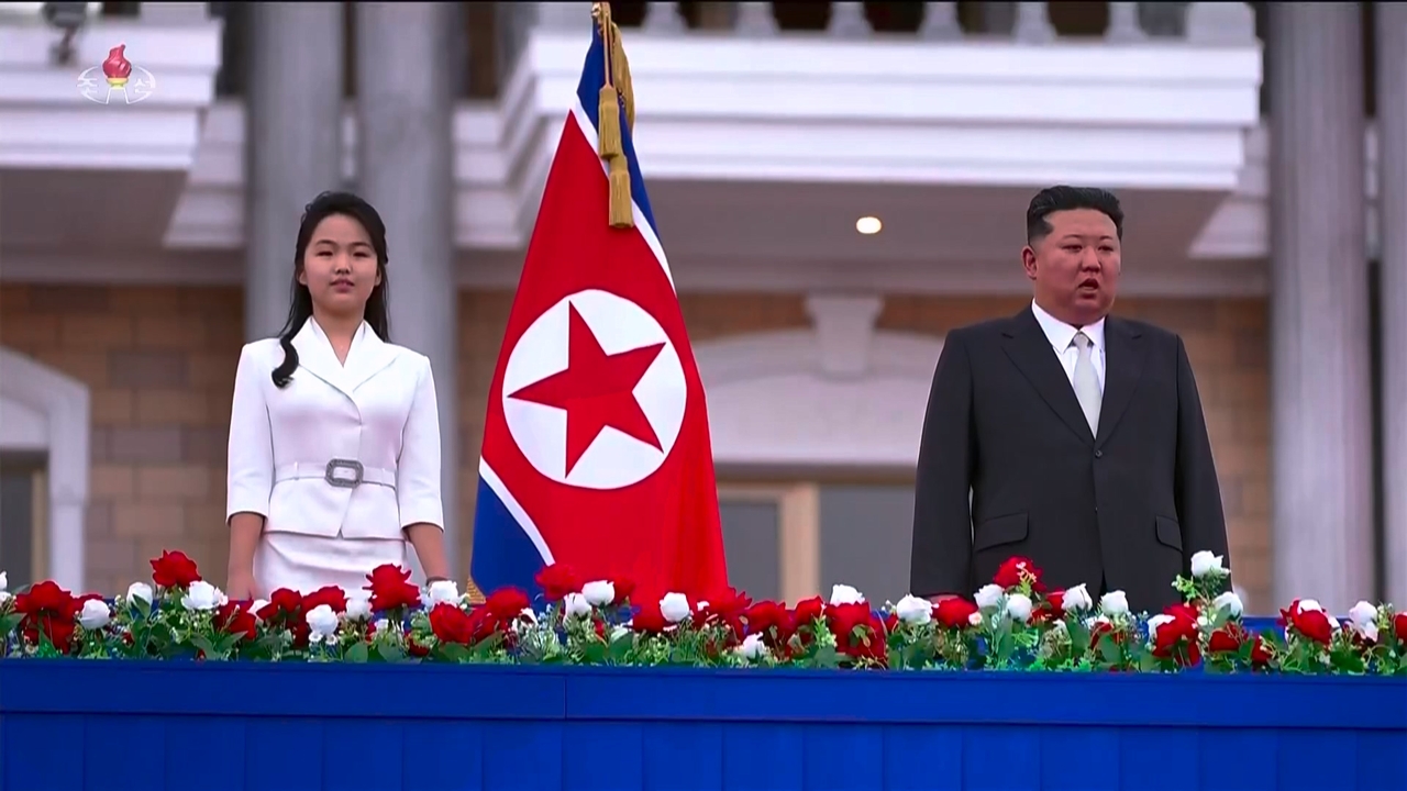 North Korean leader Kim Jong-un, accompanied by his daughter Kim Ju-ae (left) attends the completion ceremony of the Wonsan-Kalma tourist area on the North's east coast on June 24, according to North Korea's official Korean Central Television. (Newsis)