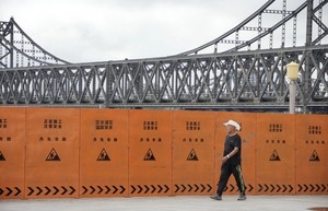 Tension in Beijing as Kim's train expected to arrive