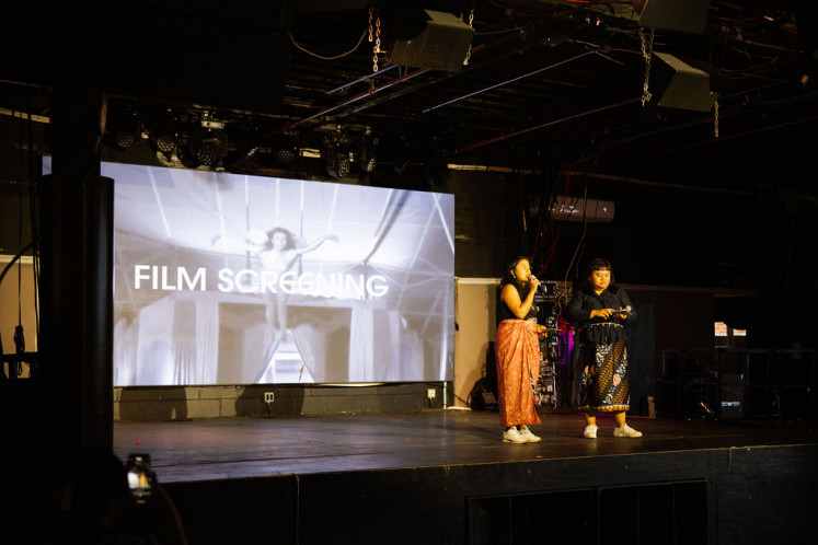 Anne Yasmine (second from left), executive producer of the XXINY Take 1: Indonesian Film Night, accompanied by poet and theater critic Patricia Kusumaningtyas, opens the screening event at The Brooklyn Monarch in New York.     (Jakarta Post)