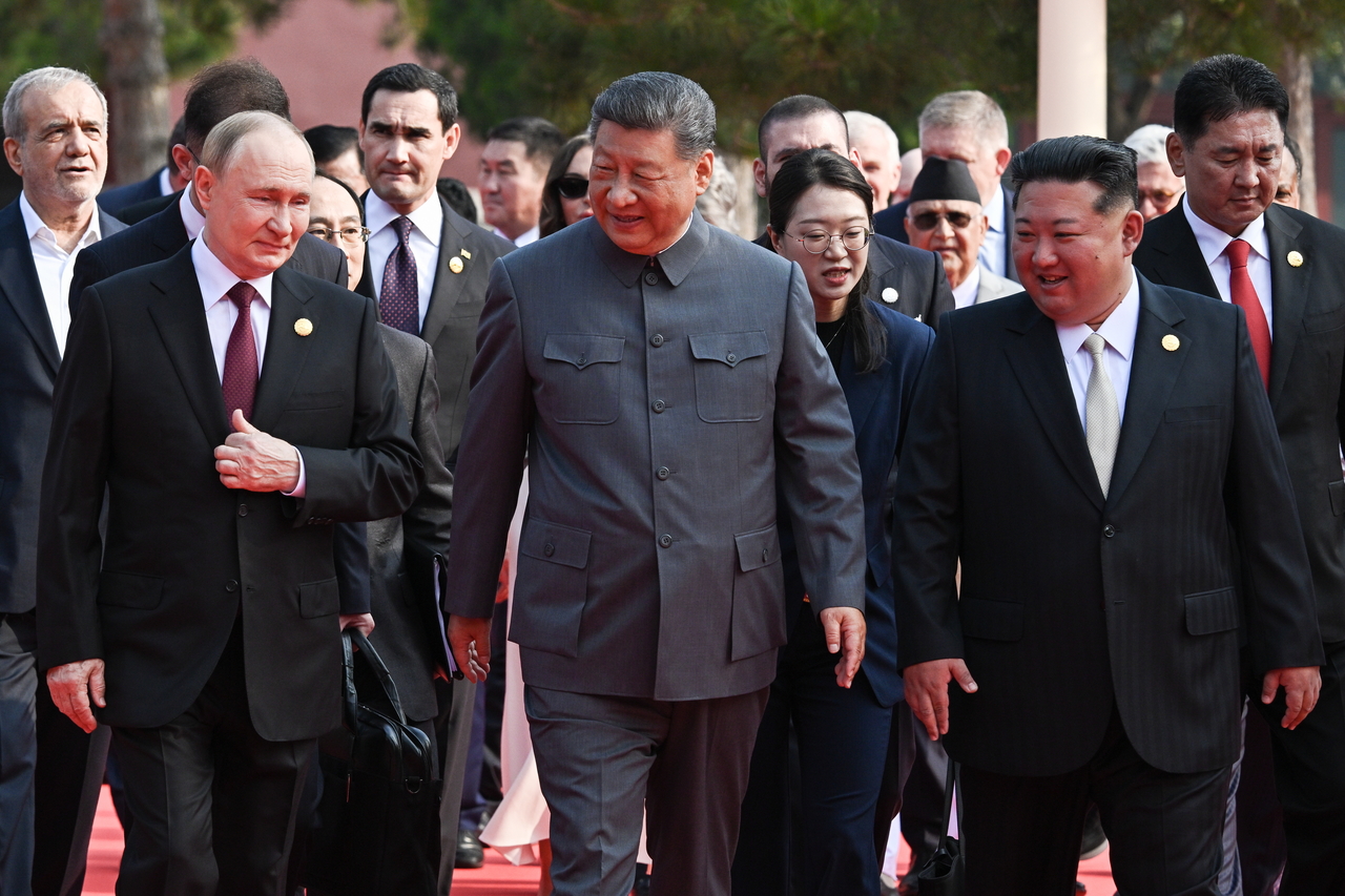 Russian President Vladimir Putin, Chinese President Xi Jinping, North Korea's leader Kim Jong-un (From left to Right) are seen ahead of a military parade marking the 80th anniversary of the end of World War II on Wednesday. (Pool via TASS)