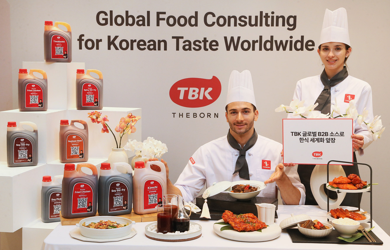 TheBorn Korea showcases new sauce line, TBK, at a media event held Wednesday in Seoul. (TheBorn Korea)