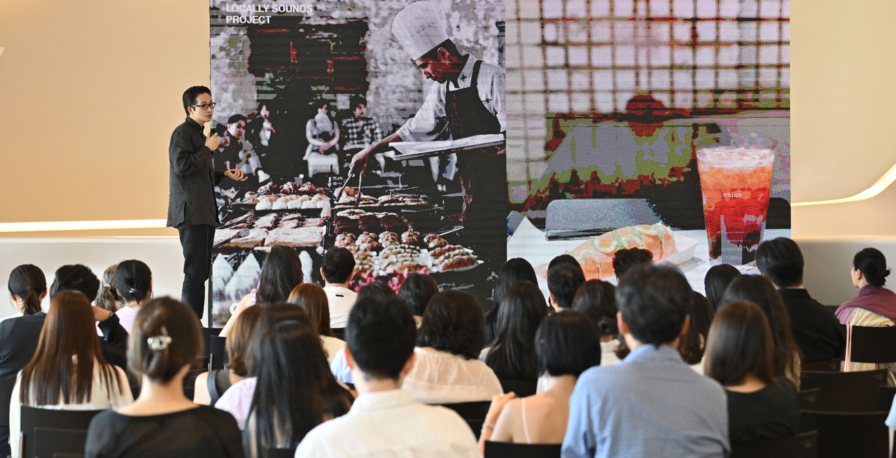 Yu Zu-hyung, CEO of Cafe Onion and Chicory Hotel, shares his experiences on running a business on Tuesday at Dongdaemun Design Plaza. (Im Se-jun/ The Korea Herald)