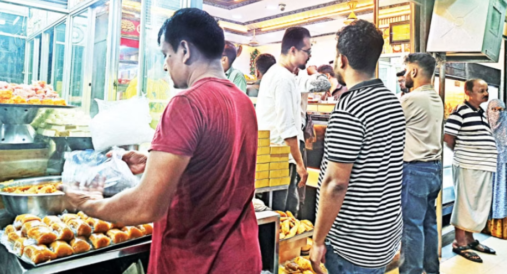Dhaka's breakfast market is particularly busy on Fridays.   Daily Star