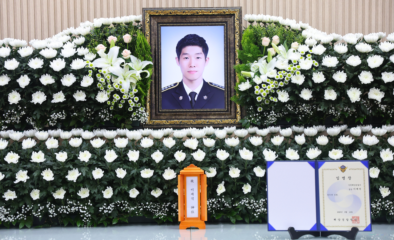 A portrait of the late Sgt. Lee Jae-seok of the Coast Guard is seen at his funeral, held in Dong-gu, Incheon, on Thursday. (Yonhap)