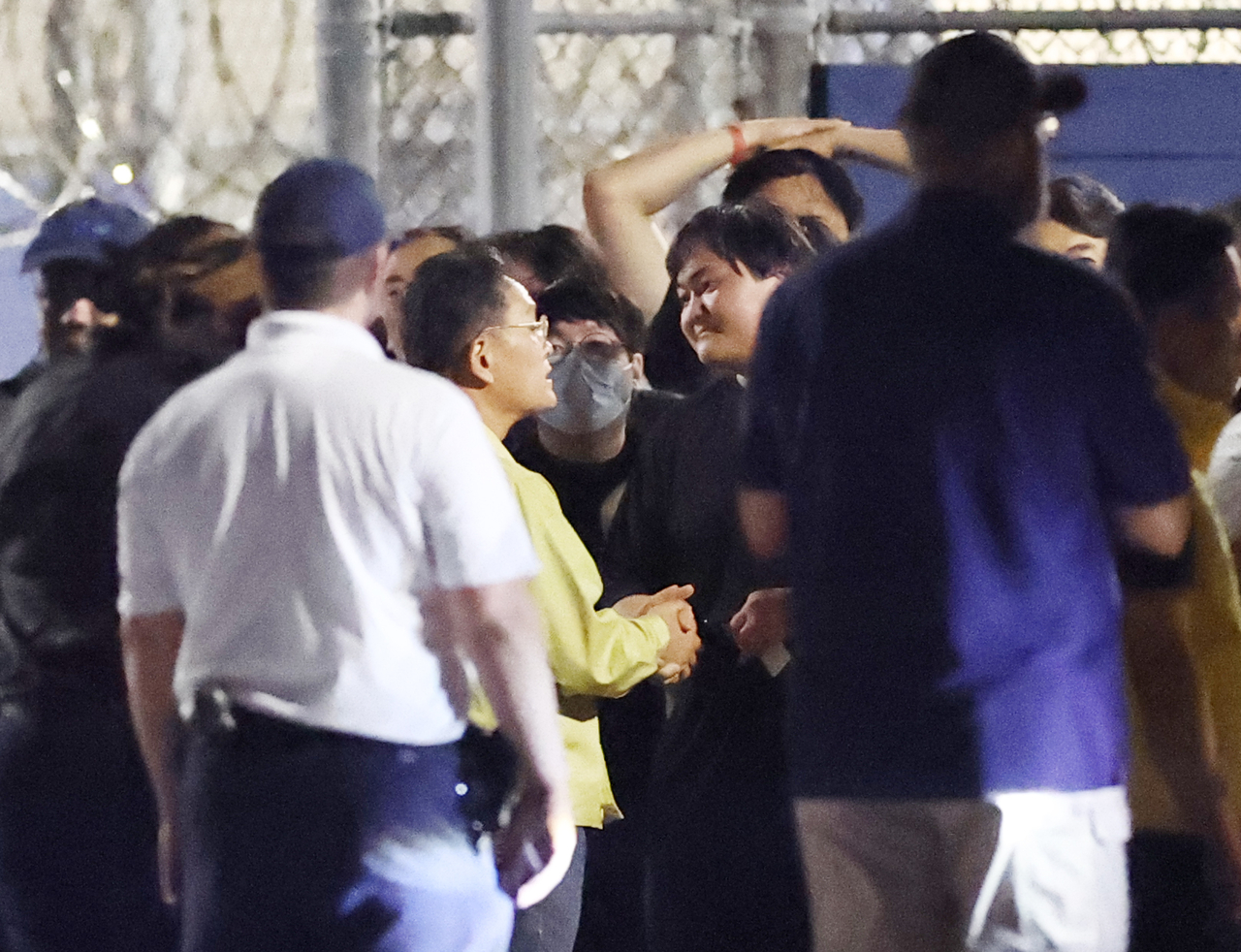 Workers from the Hyundai Motor–LG Energy Solution battery plant construction site, previously detained at an ICE facility in Folkston, Georgia, board a bus to the airport on Thursday. (Yonhap)