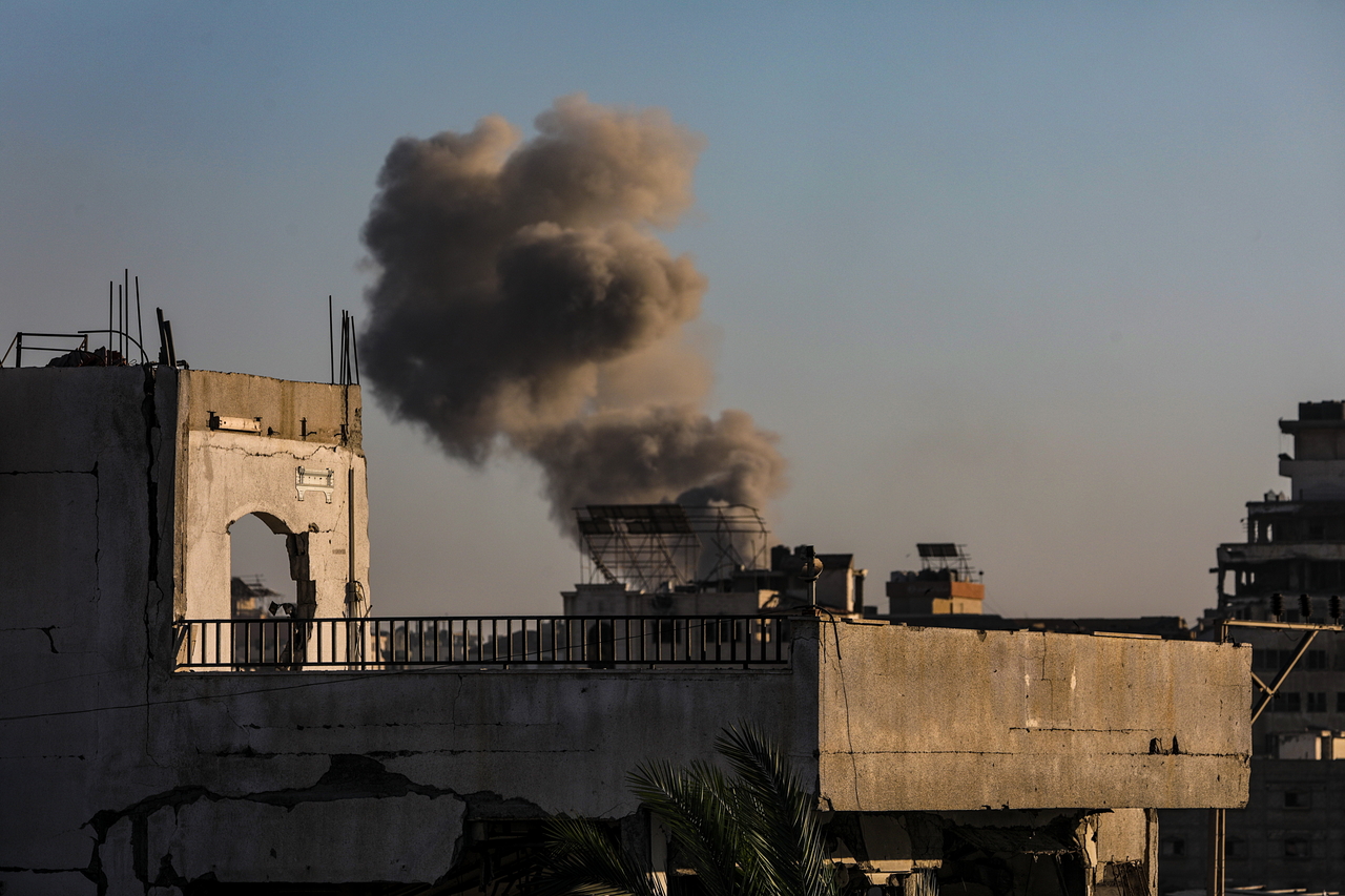 Smoke rises following an Israeli airstrike on the Public Prosecution building in Gaza City, Gaza Strip, Saturday. (EPA-Yonhap)