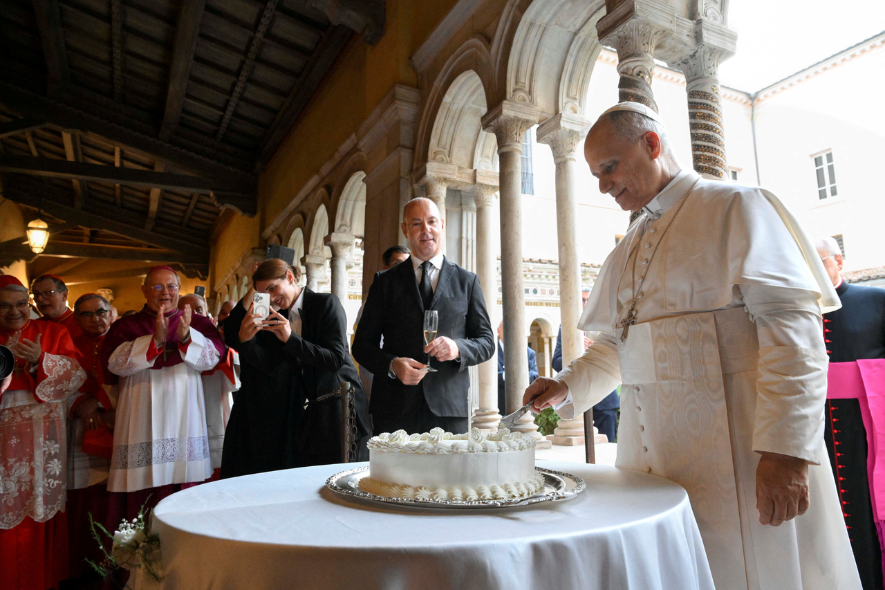 Pope Leo cuts a cake as he marks his 70th birthday with with cardinals, Christian representatives and dignitaries, at the Basilica of St. Paul in Rome, Sunday.   (Reuters-Yonhap )