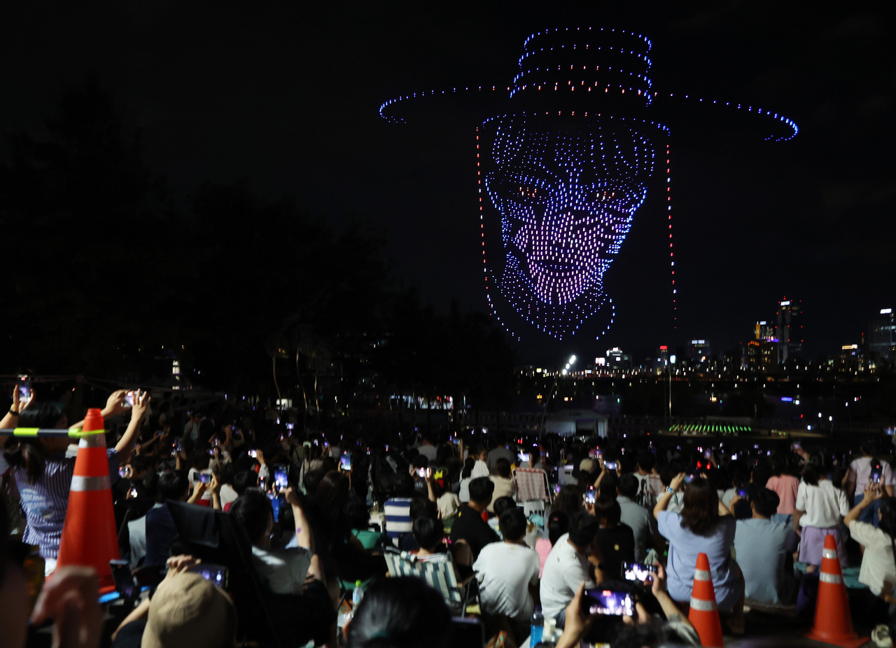 More than 1,200 drones lit up the night sky over the riverside stage during '2025 Hangang Light Show' themed around 'K-pop Deomon Hunters' at Ttukseom Hangang Park on Sept. 7. (Yonhap)