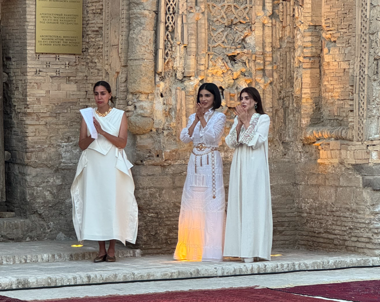 From left: Bukhara Biennial artistic director Diana Campbell, Saida Mirziyoyeva, head of the presidential administration, and Gayane Umerova, executive director of the Art and Culture Development Foundation of Uzbekistan, attend the opening ceremony of the inaugural Bukhara Biennial in Bukhara, Uzbekistan. (Park Ga-young/The Korea Herald)