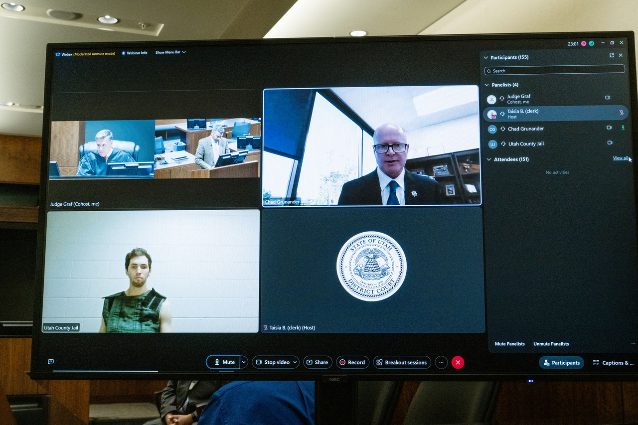 A screen shows Tyler Robinson (bottom left), the suspect in the killing of political activist Charlie Kirk, as he attends a court appearance remotely from his jail cell in Provo, Utah, Tuesday. (AFP-Yonhap)