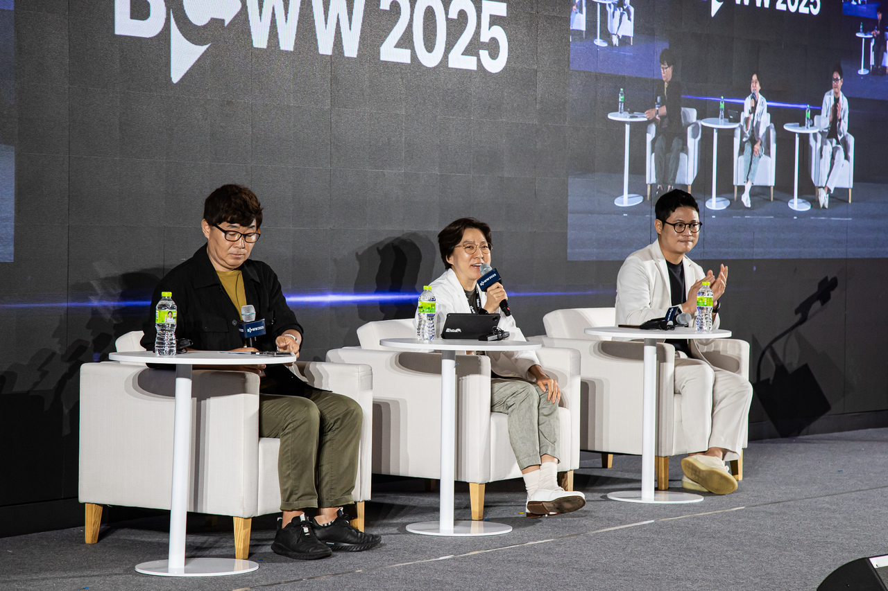 Choi Yeo-nu (center), director of local content at The Walt Disney Co. Korea, and Charlie Moon (right), head of content business at Coupang Play, speak during a session held at BCWW 2025 on Wednesday. (KOCCA)