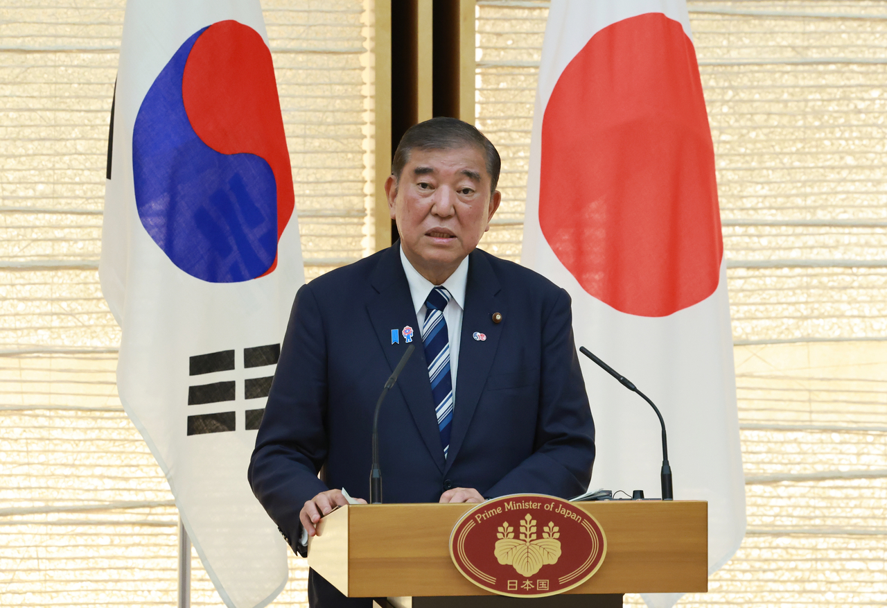 Japanese Prime Minister Shigeru Ishiba attends a joint press conference with South Korean President Lee Jae Myung following their talks at the premier's office in Tokyo, Aug. 23, 2025. (Yonhap)