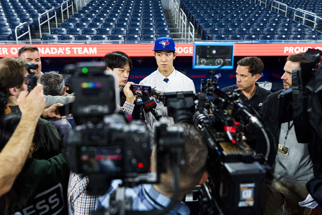 Korean-born pitcher Seojun Moon speaks to the media after singing with the Toronto Blue Jays before the MLB game against the Boston Red Sox at the Rogers Centre on Wednesday, in Toronto, Ontario, Canada. (Getty Images)