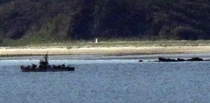 North Korean ship with Chinese flag retreats after crossing sea border