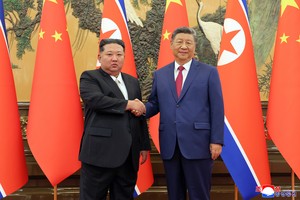 N. Korea's Kim, in message to Xi, vows strong ties with China regardless of changes in intl. situation