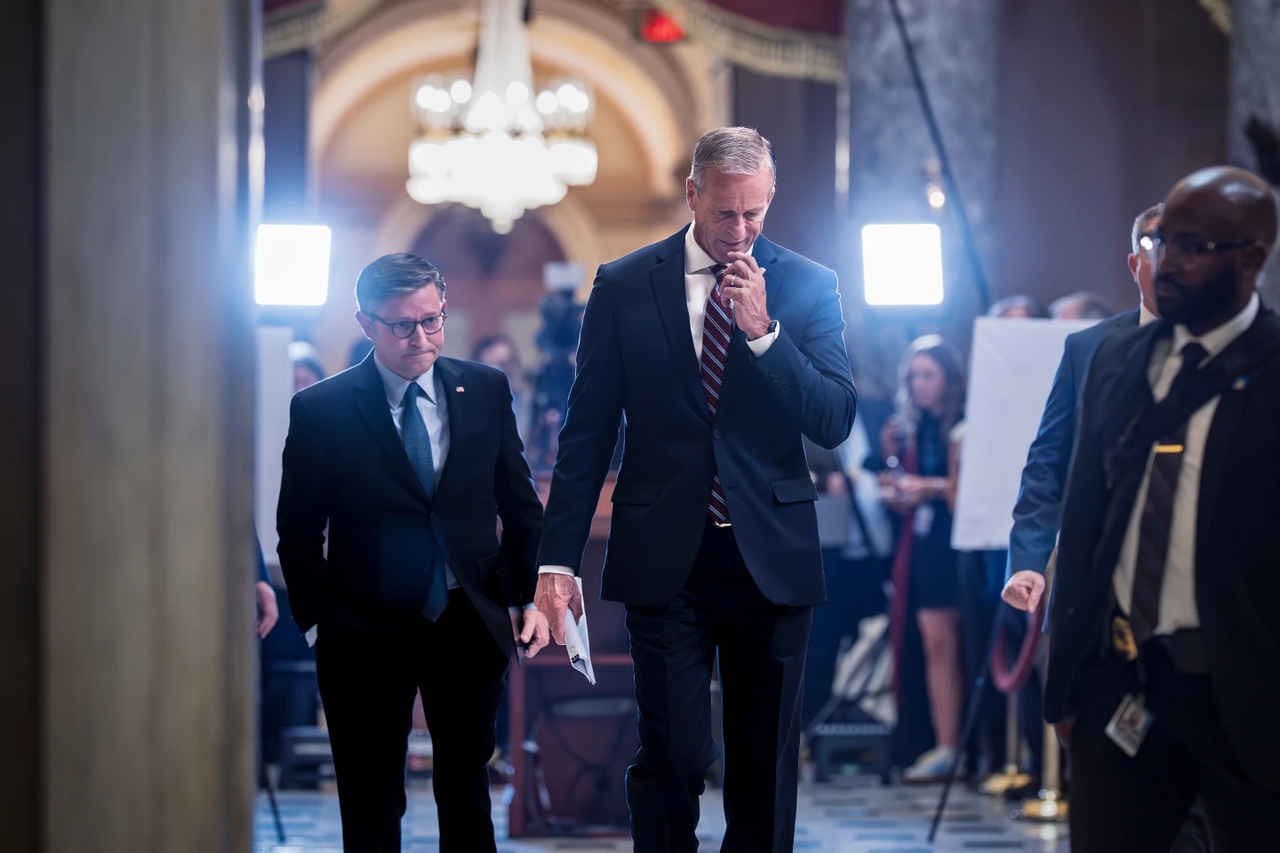 Speaker of the House Mike Johnson (left), R-La., and Senate Majority Leader John Thune, R-S.D., return to their offices after meeting with reporters on the third day of the government shutdown, at the Capitol in Washington, Friday. (AP)
