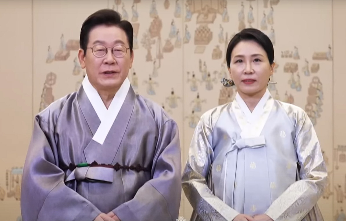President Lee Jae Myung (left) delivers a speech in a video uploaded to the state-run KTV YouTube channel, appearing alongside First Lady Kim Hea Kyung. (Screenshot from KTV’s YouTube channel)