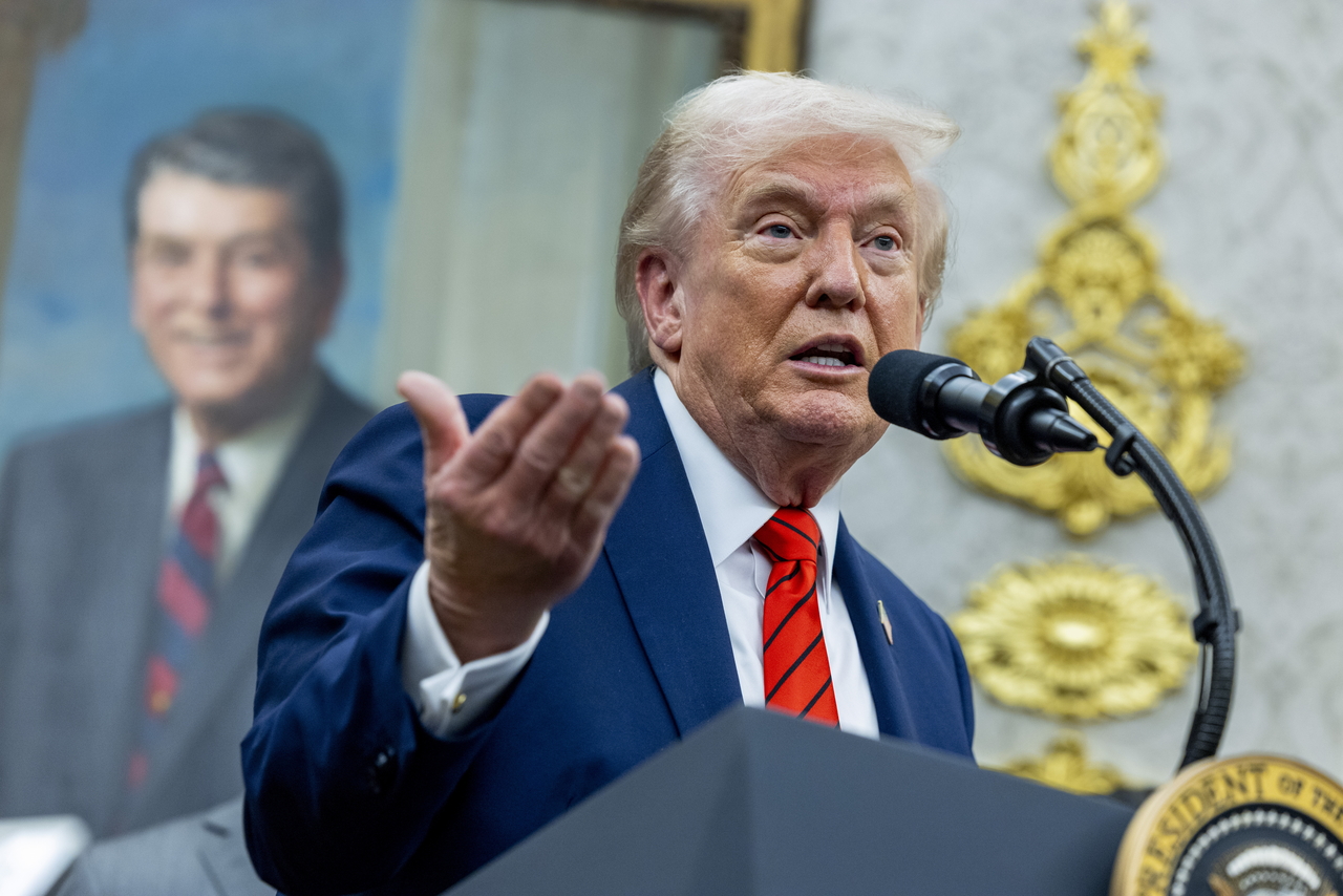 US President Donald Trump responds to a question from the news media following the announcement of a drug pricing deal during a press conference in the Oval Office of the White House in Washington, Friday. (EPA-Yonhap)