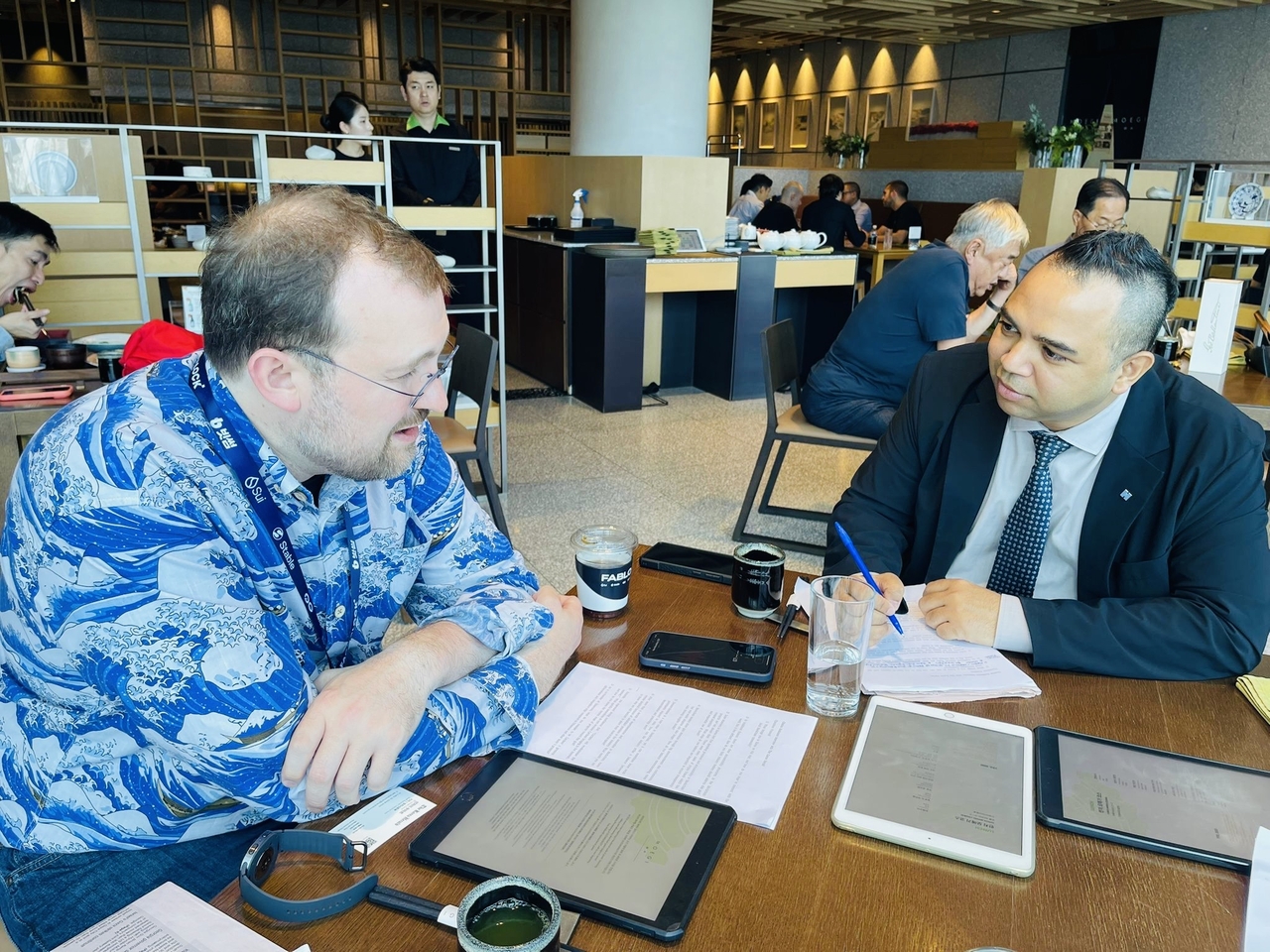 Charles Hoskinson, co-founder of the ethereum blockchain platform and CEO of Input Output( left) speaks in an interview with The Korea Herald at Grand Walkerhill Seoul on Sept. 23. (Sanjay Kumar/ The Korea Herald)