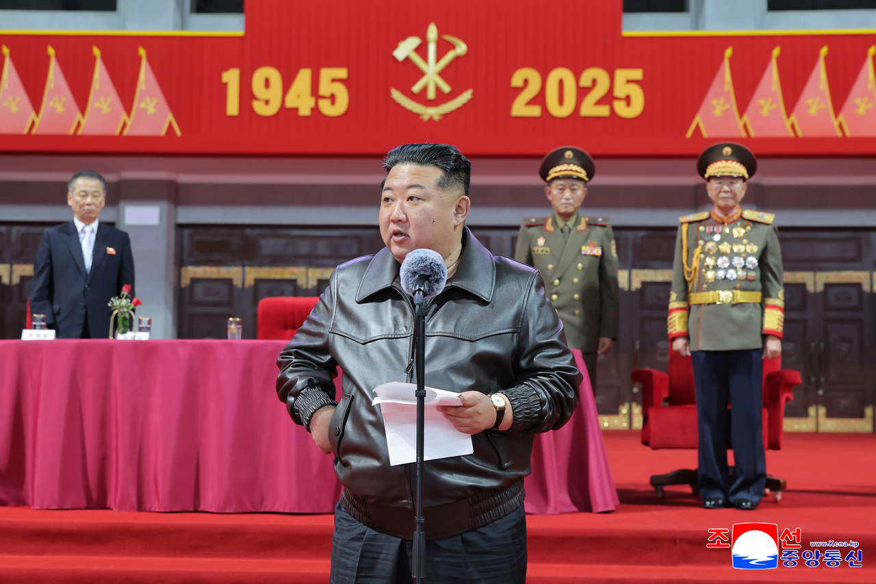 North Korean leader Kim Jong-un attends the mass gymnastics and art performance “Long Live the Workers’ Party of Korea” with participants of an event marking the party’s 80th founding anniversary in Pyongyang on Sunday. (Yonhap)