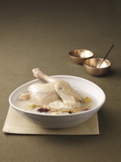 Dak baeksuk, whole chicken soup with glutinous rice