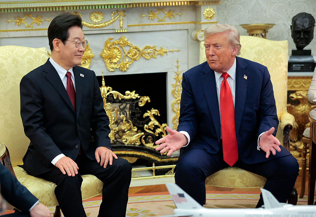 US President Donald Trump (right) meets with President of South Korea Lee Jae Myung in the Oval Office at the White House on August 25 in Washington, DC.  (Getty Images)
