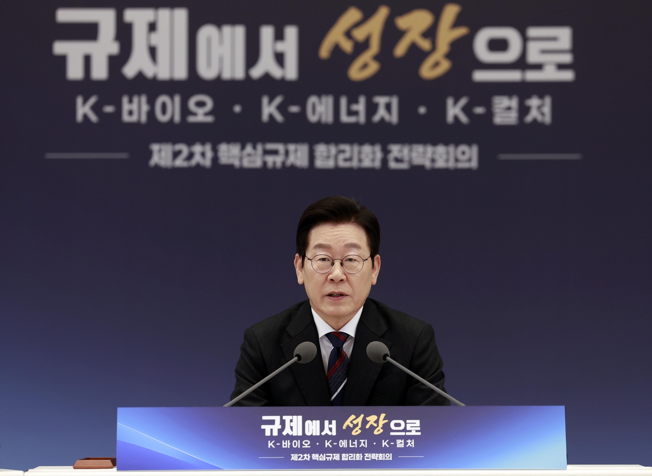 President Lee Jae Myung speaks during an interagency meeting on rationalizing key regulations held at the presidential office in Seoul on Thursday. (Pool photo) (Yonhap)
