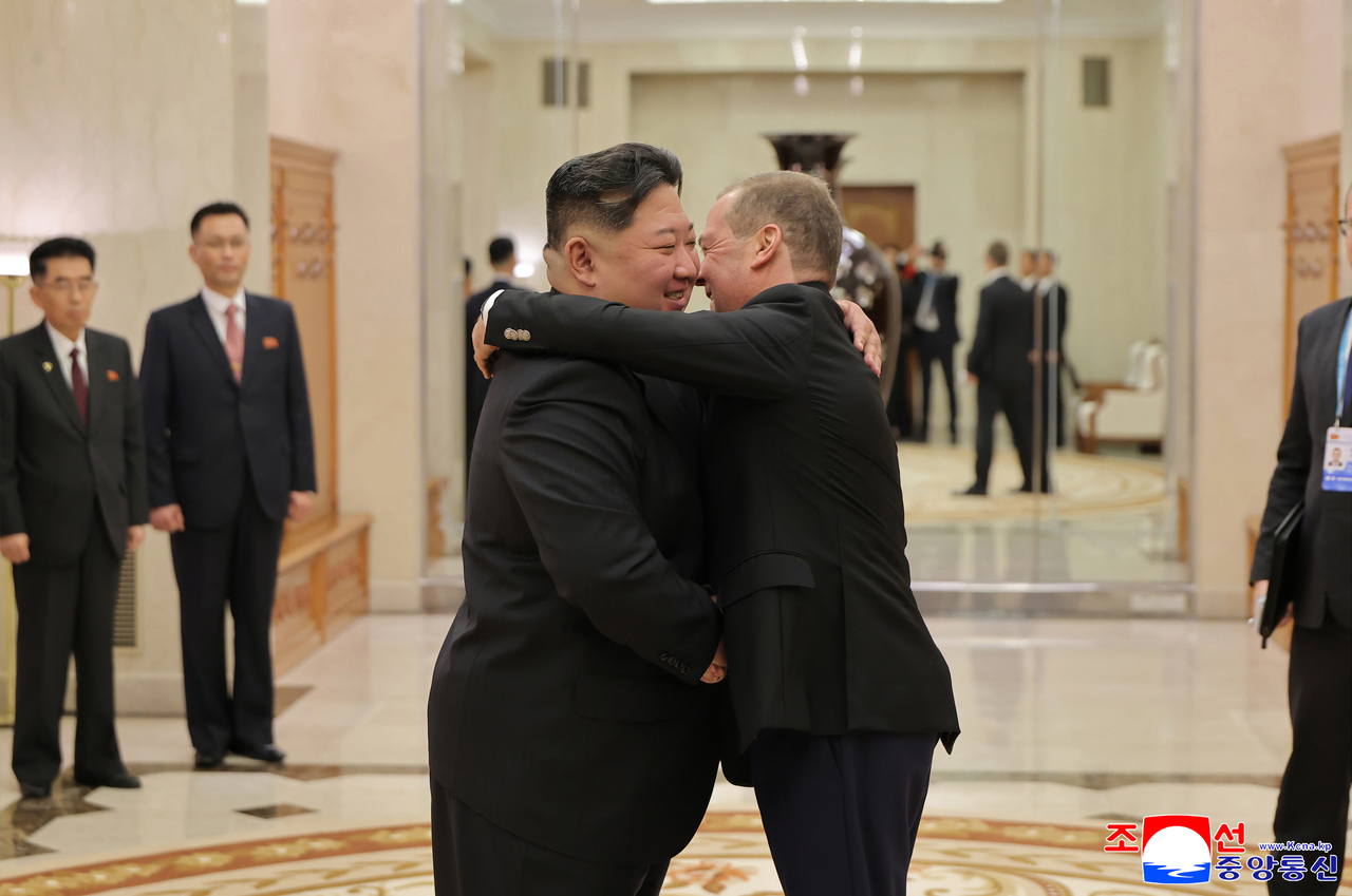 This photo shows North Korean leader Kim Jong-un (L) and Dmitry Medvedev (R), deputy chairman of the Russian Security Council, share an embrace in Pyongyang on Saturday, to attend celebrations for the 80th anniversary of the Workers' Party of Korea. (For Use Only in the Republic of Korea. No Redistribution) (Yonhap)