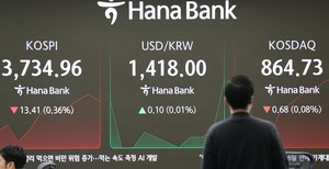 Seoul shares open lower on US losses