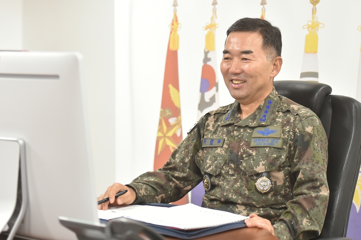 Joint Chiefs of Staff Chairman Gen. Jin Yong-sung holds phone talks with his US counterpart, Gen. Dan Caine, on Friday, in this photo provided by the JCS. (Yonhap)