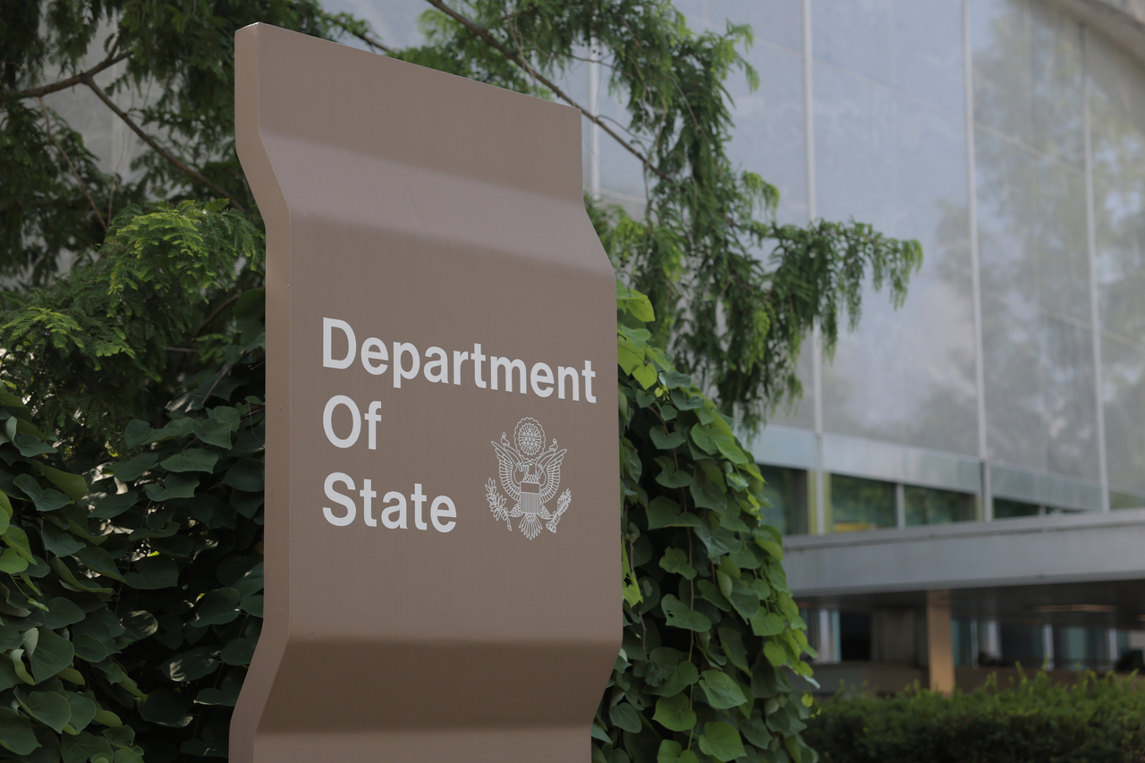 A sign for the US Department of State is seen on the outside of the Harry S. Truman Federal Building on on July 11, 2025 in Washington, DC. (Getty Images)