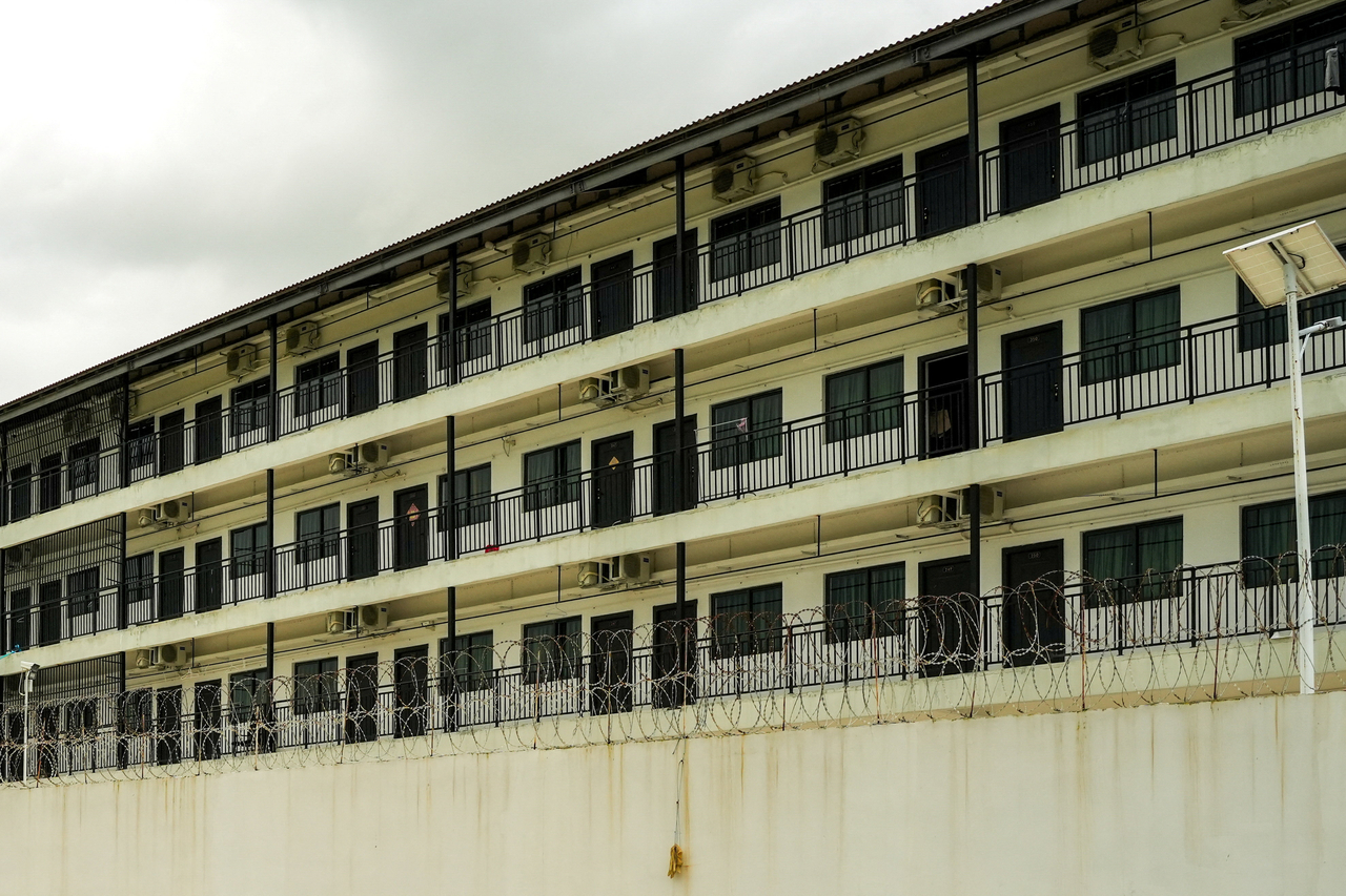 Barbed wire lines the perimeter of a compound in Takeo province, Cambodia, that South Korea's Vice Foreign Minister Kim Jina visited after meeting Cambodian Prime Minister Hun Manet Thursday to discuss the problem of job scams in the Southeast Asian country. (Reuters)