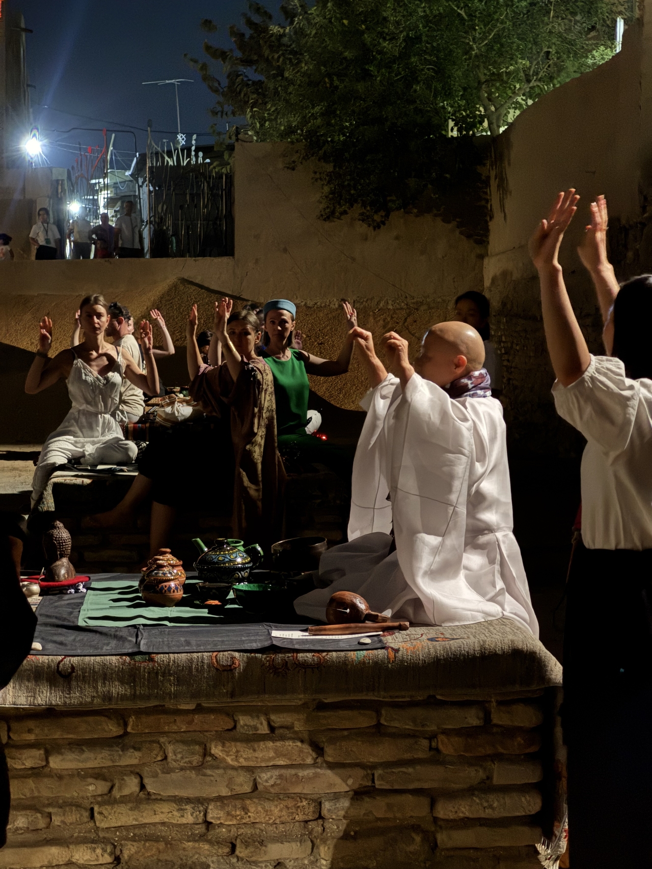 The Ven. Jeong Kwan (second from right) leads a food meditation session at the Bukhara Biennial in Bukhara, Uzbekistan, on Sept. 5. (Park Ga-young/The Korea Herald)