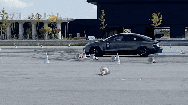 The Ioniq 6 N drifts during a demonstration run at a media test drive event in Taean, South Chungcheong Province, Thursday.  (Lim Jae-seong / The Korea Herald)