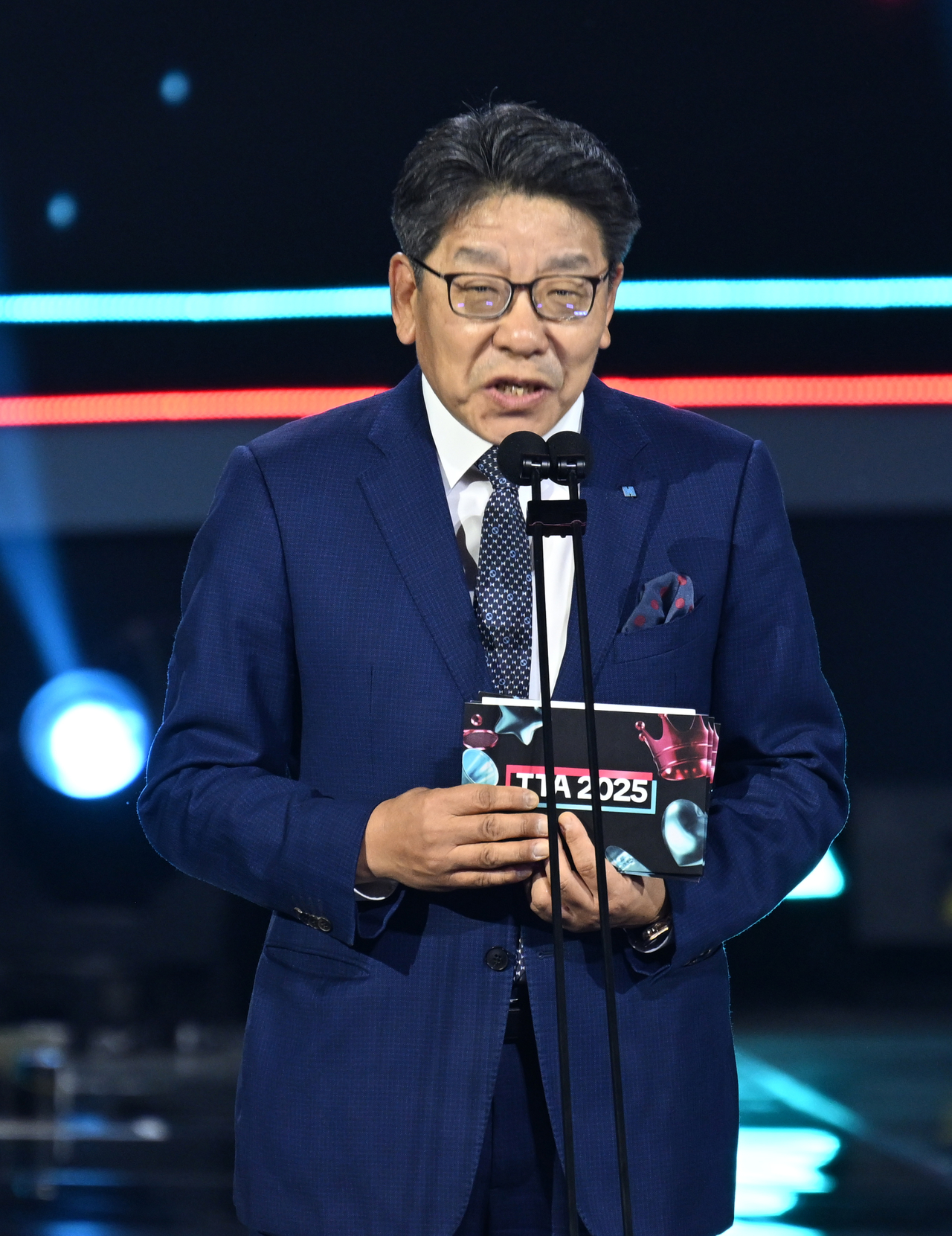 Choi Jin-young, CEO of The Herald Media Group, delivers remarks before presenting the Social Impact Artist award to Big Ocean during the TikTok Awards 2025 at Korea University’s Hwajeong Gymnasium in Seongbuk-gu, Seoul, Saturday. (Yoon Byung-chan/The Korea Herald)