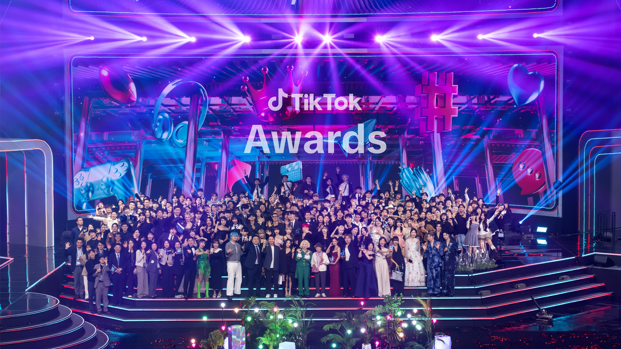 Participants of TikTok Awards 2025 pose for a photo on the stage at Korea University's Hwajeong Gymnasium in Seoul, Saturday. (TikTok Korea)