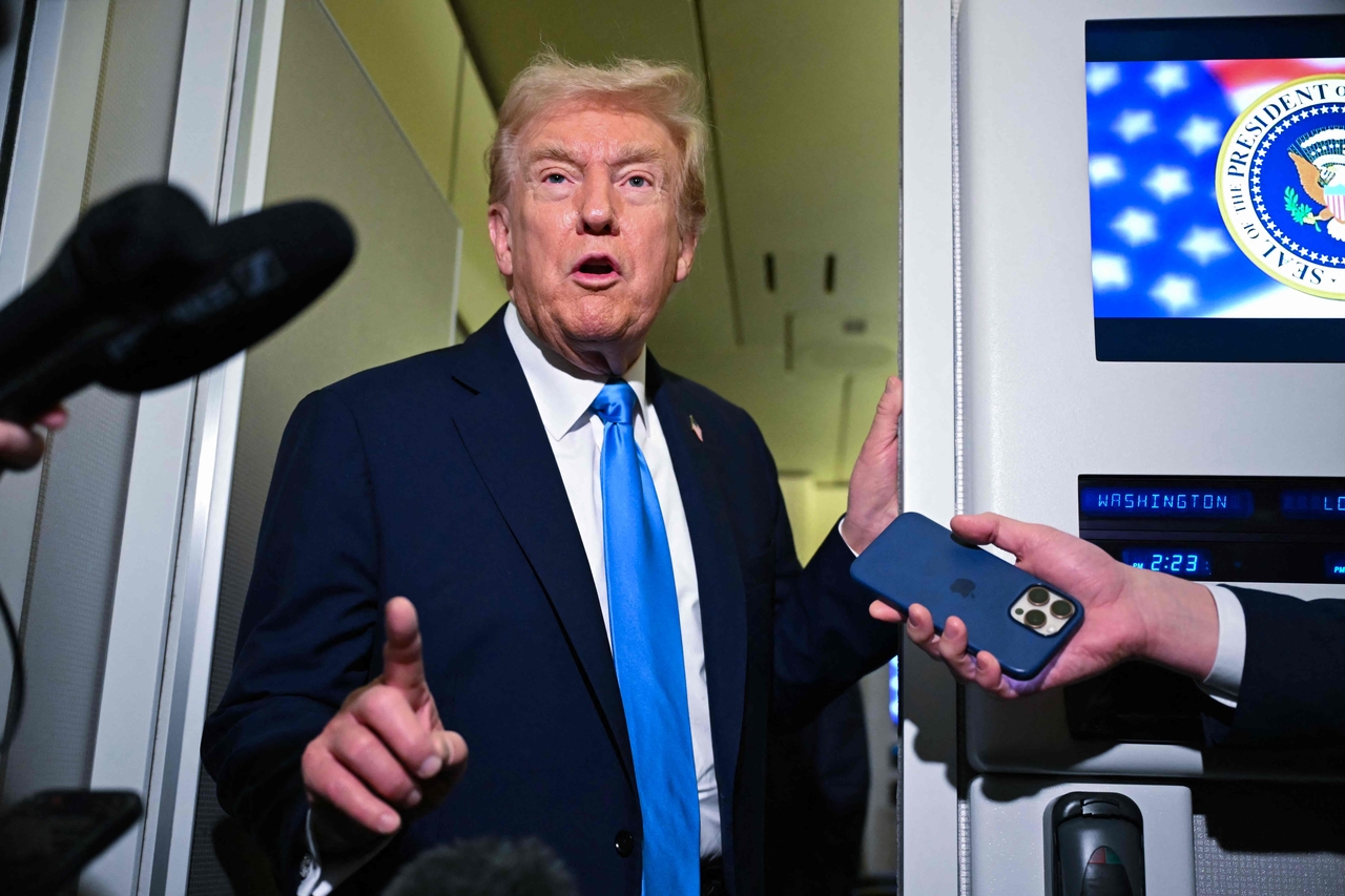 US President Donald Trump speaks to the media aboard Air Force One in Doha, Qatar, Saturday. (AFP-Yonhap)