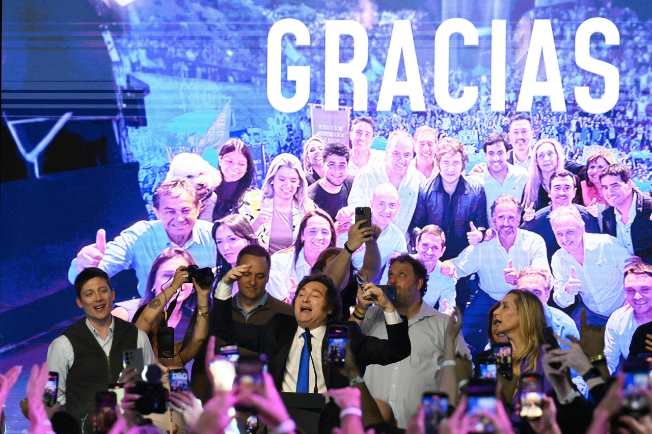 Argentina's President Javier Milei (center) celebrates at the ruling party's headquarters following the results of the national midterm legislative election in Buenos Aires, Argentina, Sunday. (AFP-Yonhap)