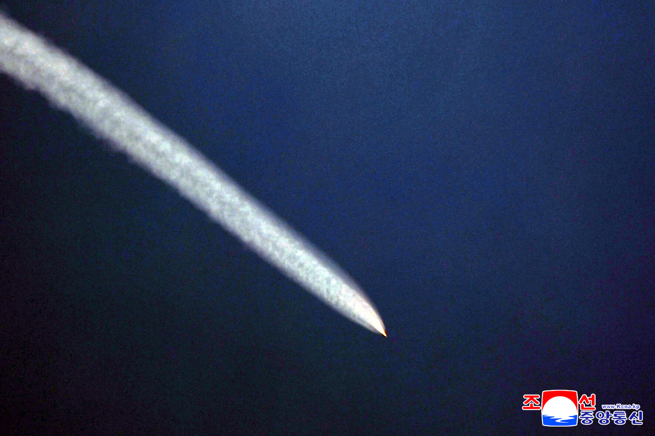 This photo from the Korean Central News Agency on Monday, shows North Korea's missile launch the previous day. (Yonhap)