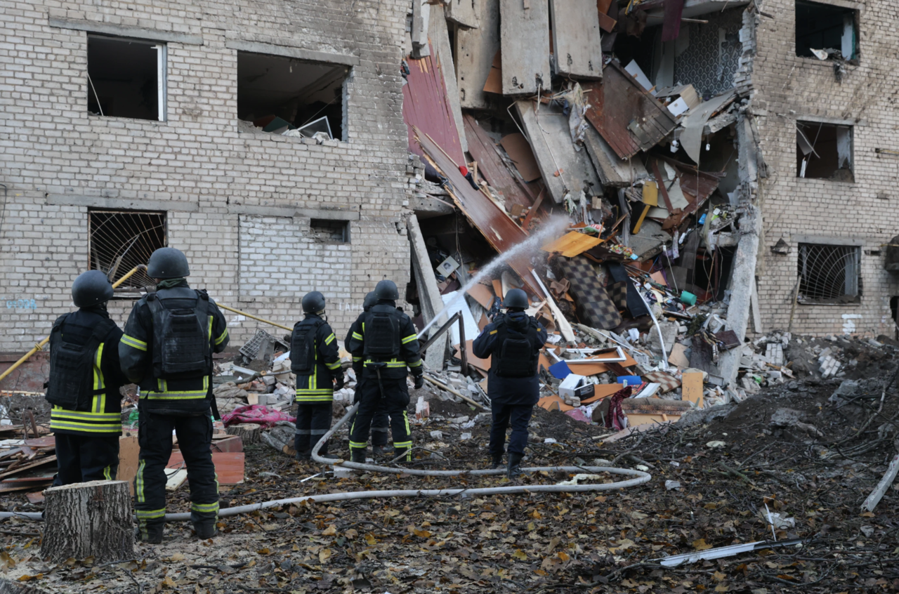 Rescuers attend to the scene after a Russian missile hit a hostel in Zaporizhzhia, Ukraine, Thursday. (AP via Yonhap)