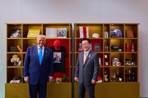 White House shares photo of Trump looking at mug shot T-shirt in meeting with Lee