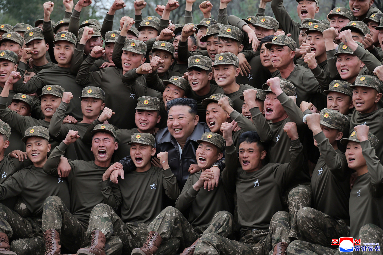North Korean leader Kim Jong-un visits the 11th Corps of the Korean People's Army, known as the “Storm Corps,” an elite special operations unit, in this photo released by the Korean Central News Agency on Sunday. (Yonhap)