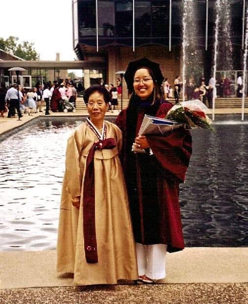 Molinaro and her mother pose for a photo during her graduation ceremony at the University of Chicago Law School in 2004. (Joanne Lee Molinaro)
