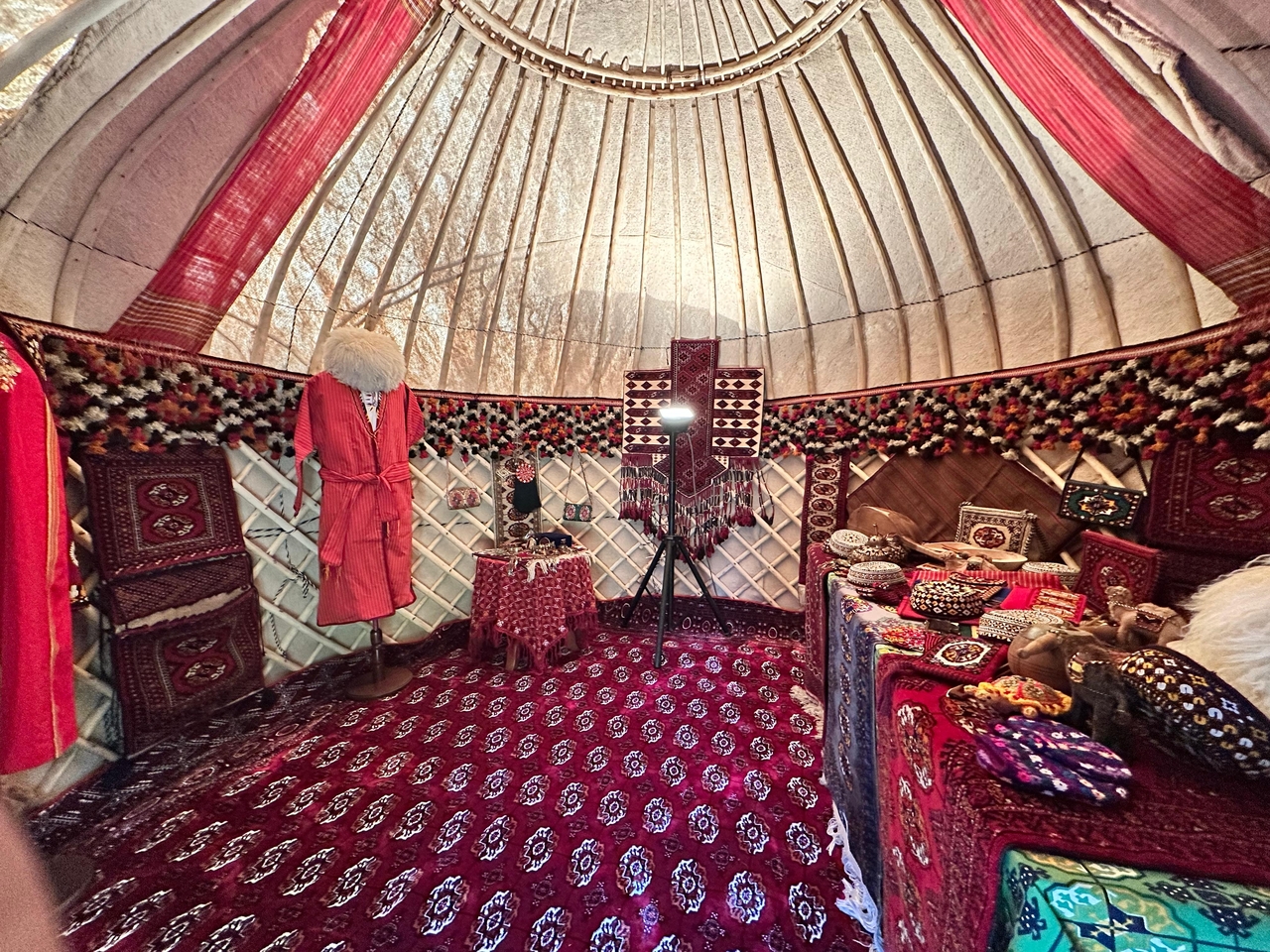 Turkmen handicraft arts, traditional Turkmen carpets jewelry and national ornaments set up inside the traditional Turkmen yurt showcased
at an event promoting peace and neutrality at the Turkmen Embassy in Seoul on October 27. (Turkmen Embassy in Seoul)